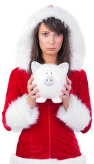 Obraz premium Sad festive woman holding a piggy bank in her hands