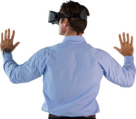Rear view of man wearing VR glasses