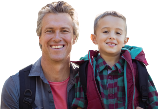 A father and his son posing 