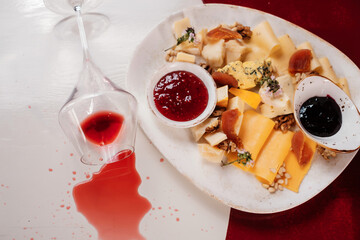 Cheese set with  jam, fruit and nuts