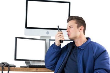 Handsome security officer talking on walkie talkie