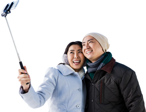 Smiling couple taking selfie