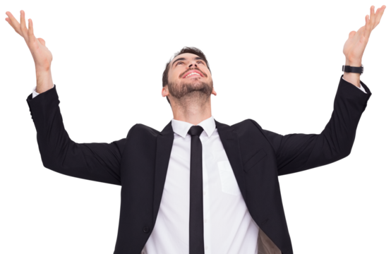 Businessman cheering with hands raised