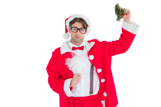 Geeky hipster in santa costume holding mistletoe   - Powered by Adobe