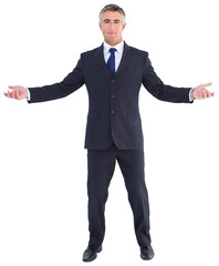 Businessman in suit spreading his arms