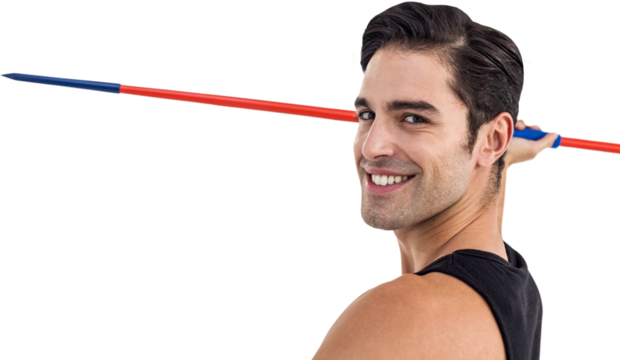Portrait of happy male athlete holding javelin