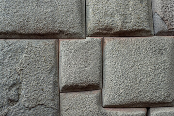 Detail of stone wall background texture, Inca wall in Cuzco, Peru