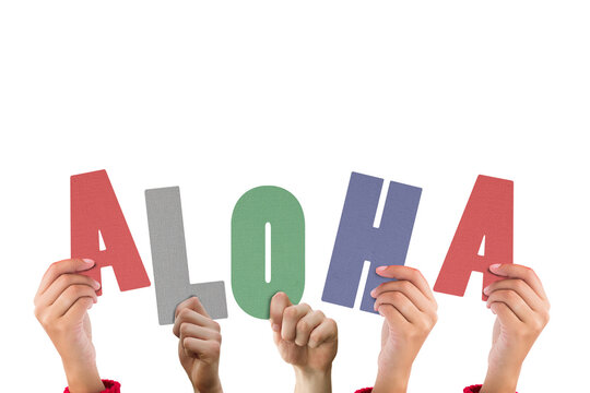 Colorful alphabet spelling greetings in Hawaiian held up by people 