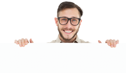 Geeky hipster showing poster smiling at camera