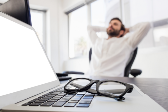 A businessman relaxing in his chair