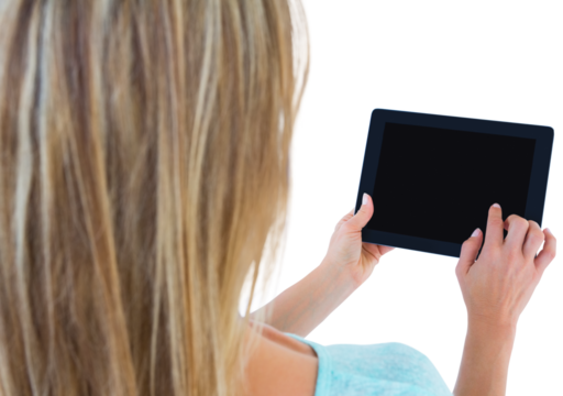 Rear view of woman using tablet pc