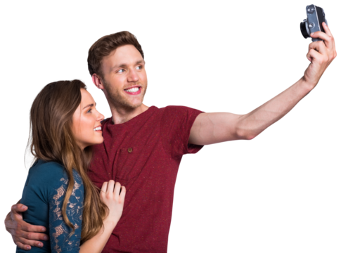 Couple taking selfie with digital camera