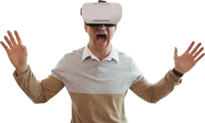 Cheerful man using virtual reality glasses