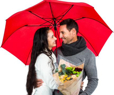 Smiling couple holding umbrella and bouquet - Powered by Adobe