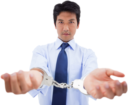 Businessman with handcuffs