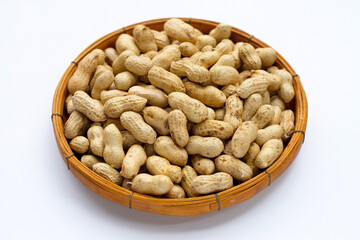 Raw peanuts on white background.