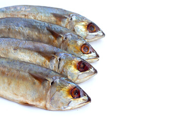 Salted fish on white background.