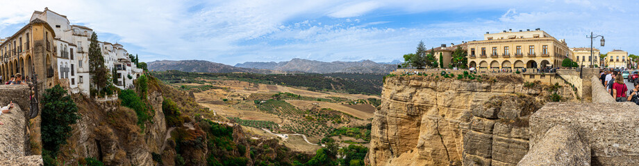 Fototapeta na wymiar Panoramic view of canyon of Ronda near new Bridge in Ronda, Spain on October 23, 2022