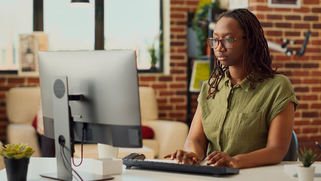 Young Woman Working Remotely From Home On Company Job, Doing Accounting Task And Checking Online Report. Looking At Internet Data And Sending Email To Manager, Marketing Network.