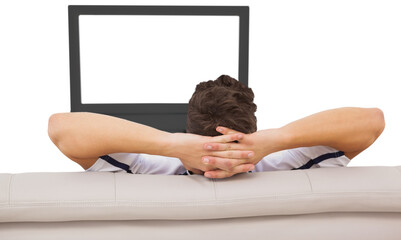 Football fan watching television
