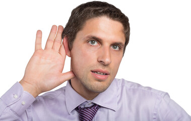 Close-up of green eyed businessman with hand to ear