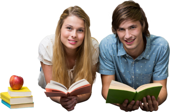 Students reading book lying on library floor