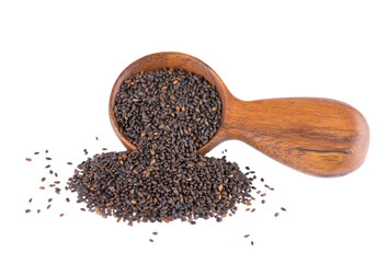 Basil seeds in wooden spoon, isolated on white background. Ocimum basilicum.