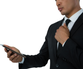 Midsection of businessman holding tie while using tablet