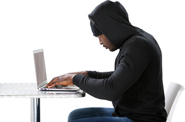 Side view of male hacker using laptop 