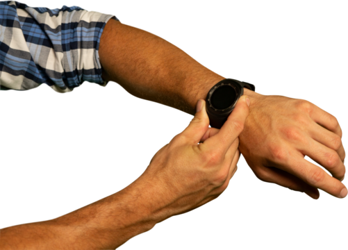 Mid-section of man using smartwatch