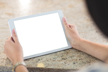 Cropped image of woman holding digital tablet