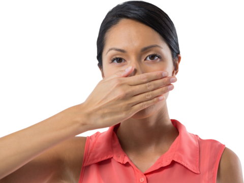 Woman covering her mouth with hand against white background