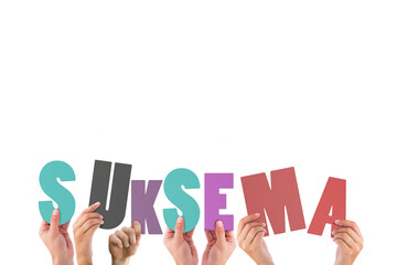 Colorful alphabet spelling thank you in Indonesian held up by people 