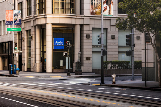 San Francisco , CA , USA.  April 02 2023  : Exterior of Charles Schwab and other office buildings at morning from the street in San Francisco's financial district.