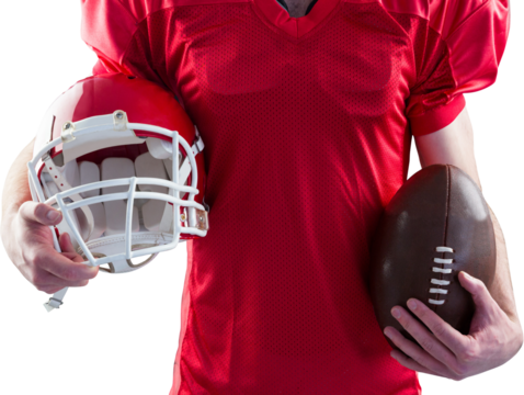 American football player holding a helmet and ball