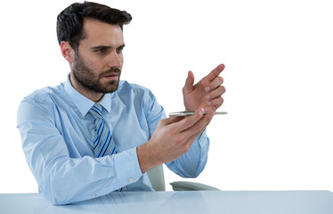 Businessman pretending to touch invisible object