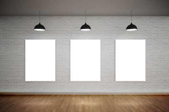 Blank posters with spotlight at museum