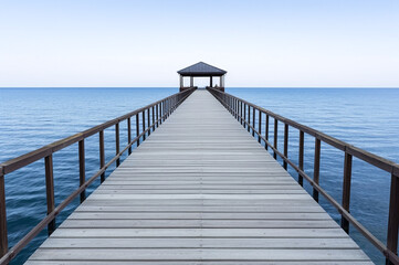 Fototapeta premium Serene ocean pier scene 