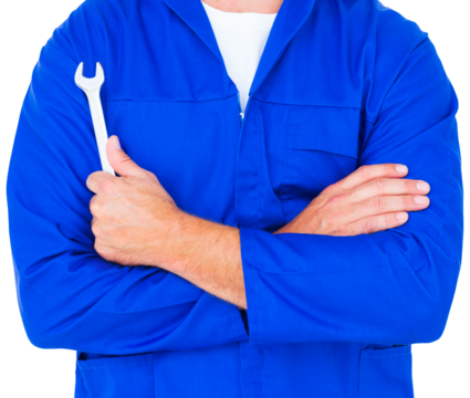 Male mechanic holding spanner on white background