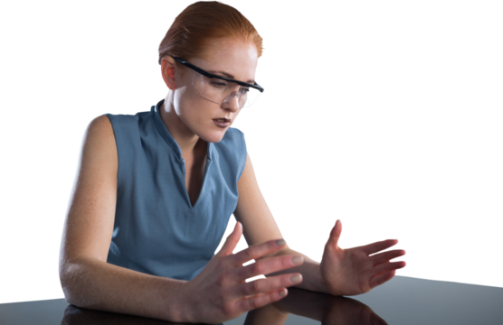 Young businesswoman gesturing while wearing smart glasses