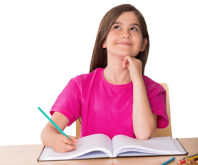Cute pupil working at her desk