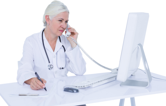 Female doctor using telephone while writing on clipboard at desk