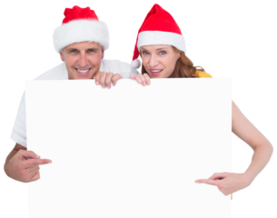 Festive couple showing a poster