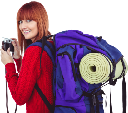 Smiling hipster woman with a travel bag