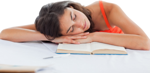 Sleeping student head on her books