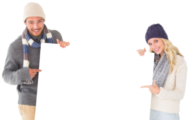 Attractive couple in winter fashion showing poster