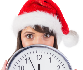Portrait of a festive brunette holding a clock