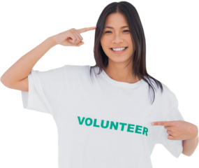 Smiling woman pointing to her volunteer tshirt
