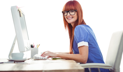 Smiling hipster woman typing on keyboard