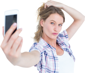 Pretty hipster taking selfie with smartphone